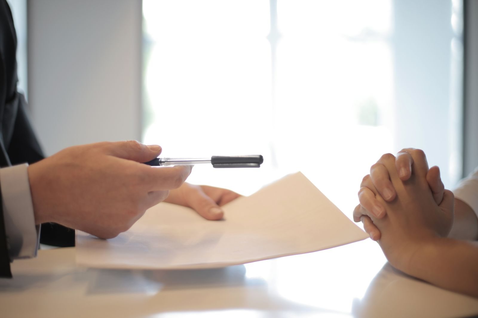 A bookkeeper and a business owner reviewing financial statements