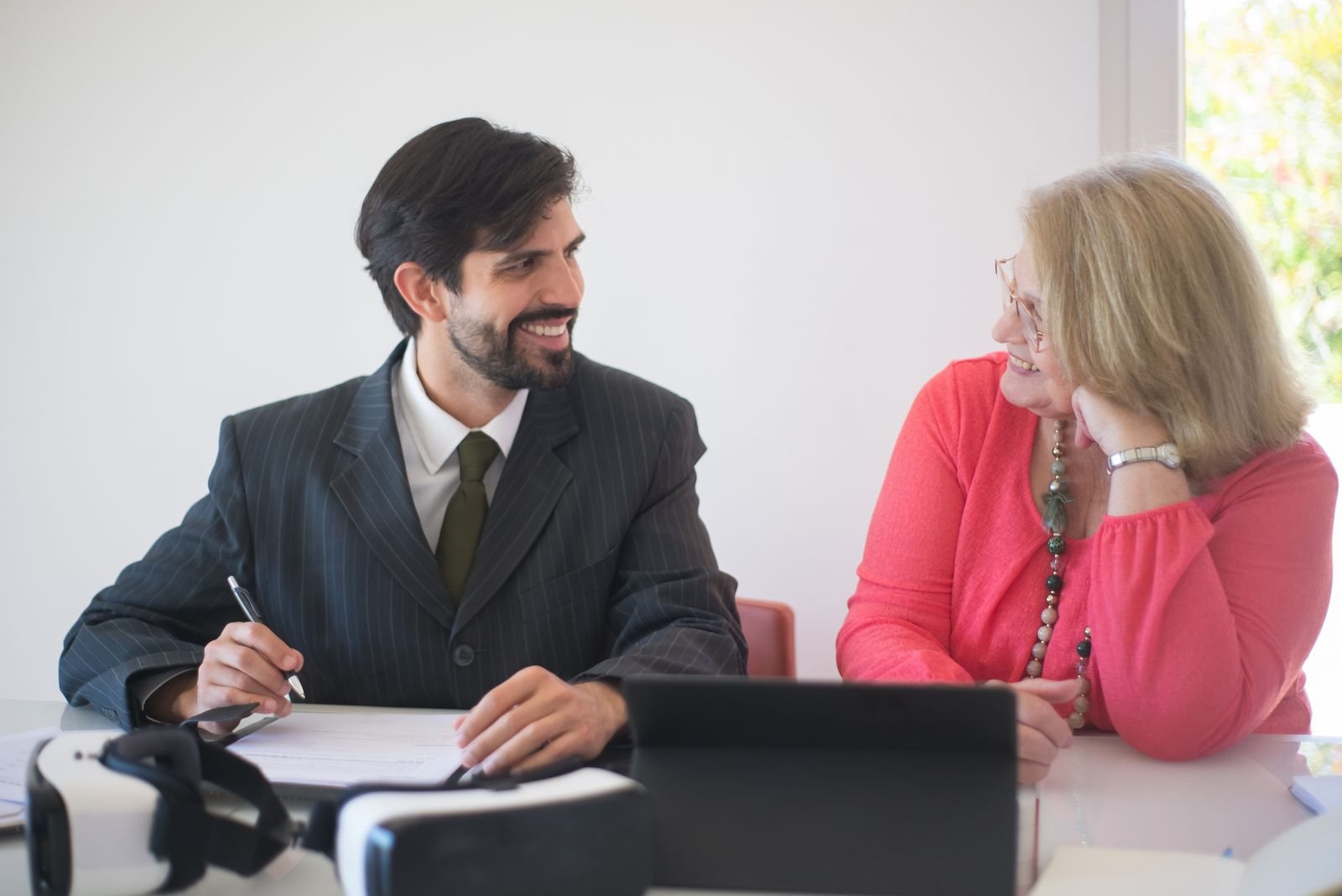 A business owner reviewing a contract with an advisor